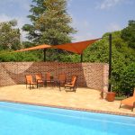 Orange Shade Sail Outdoor Area near pool