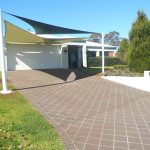 Shade Sail for Carport outside of brick house