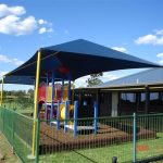 Blue and Yellow shade structure over playground